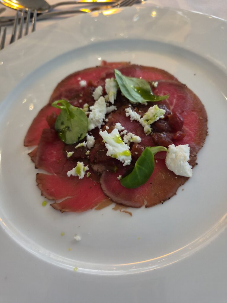 sliced meat with salad garnish and crumped chees as started for Dinner at Chilston Park Hotel