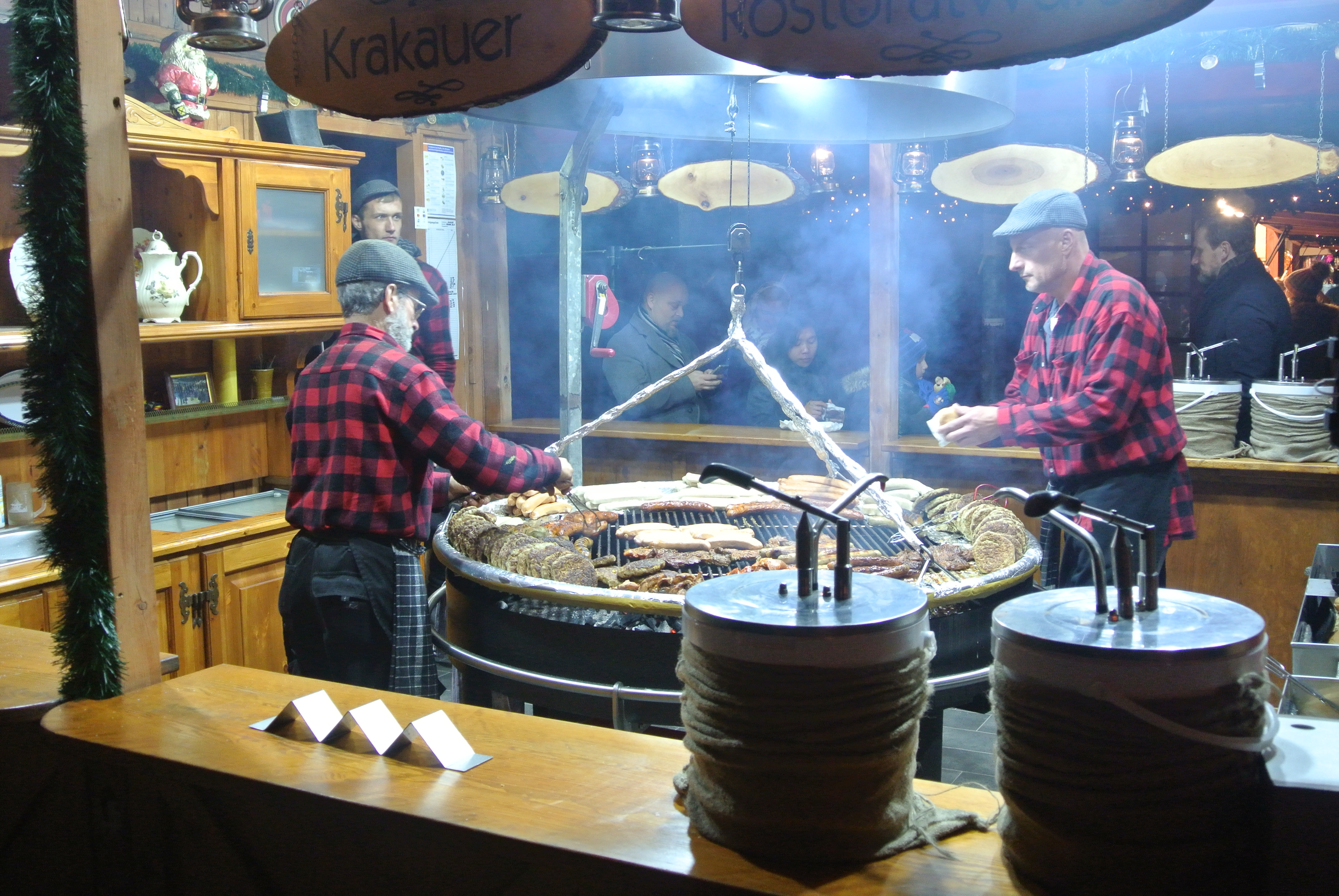 Cooking sausages at a German Christmas Market - photo by Juliamaud