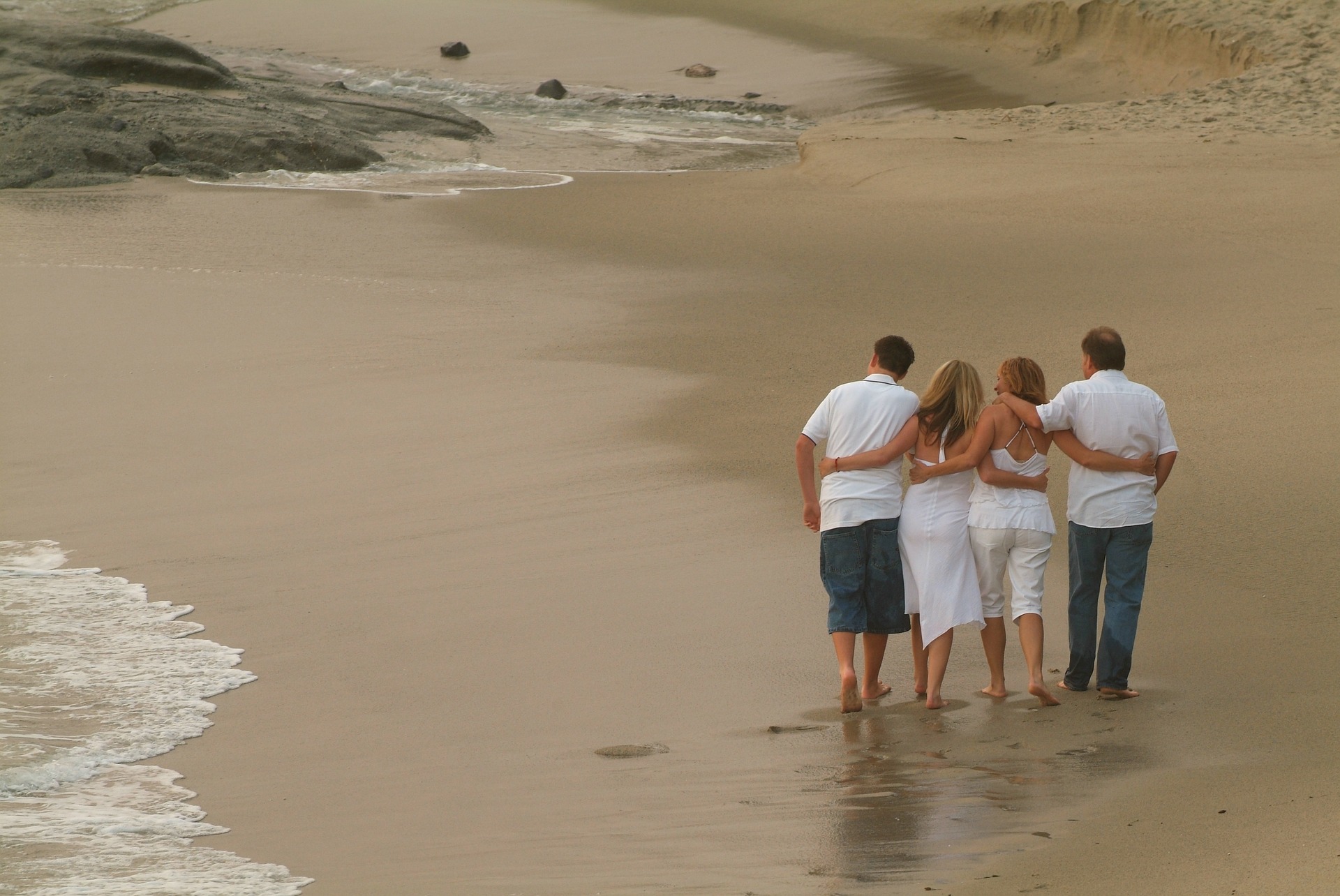 Family Vacation - photo by dave73y = https://pixabay.com/en/family-beach-surf-love-mother-216825/